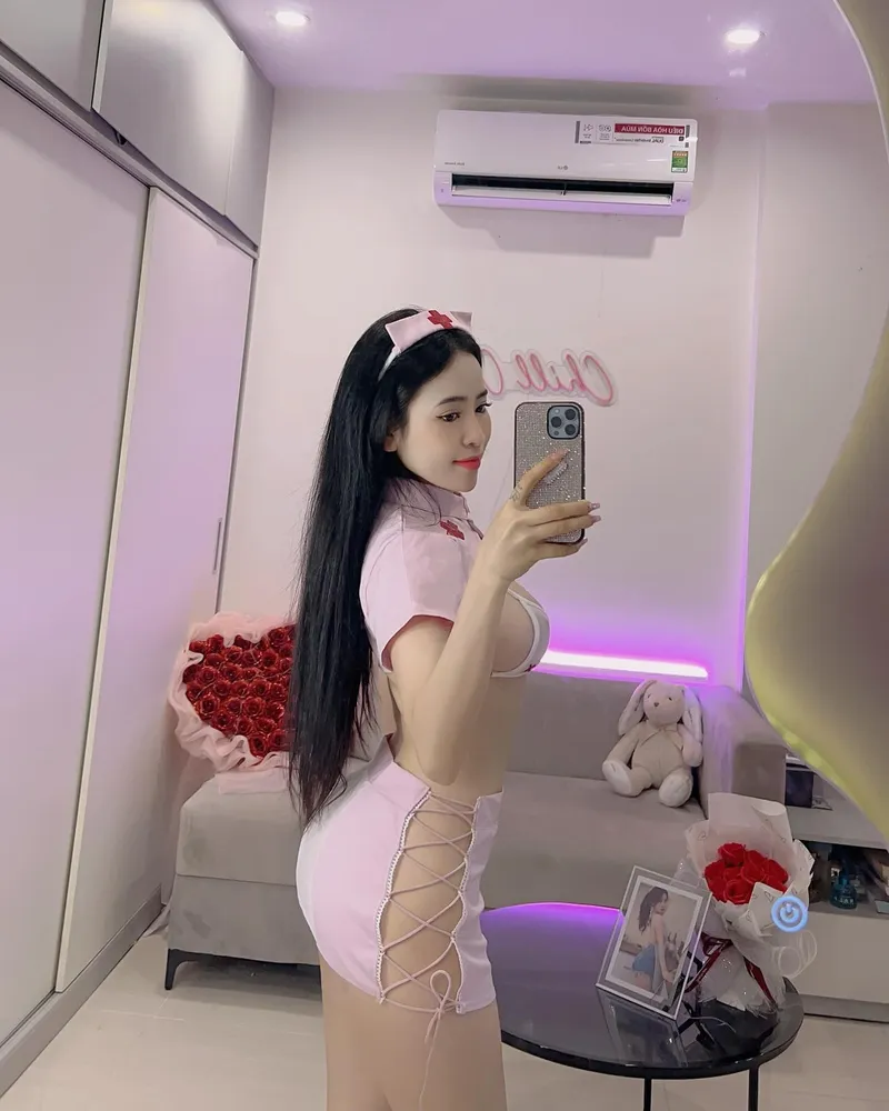 Trần Thị Nhung Chanh trong trang phục sexy 