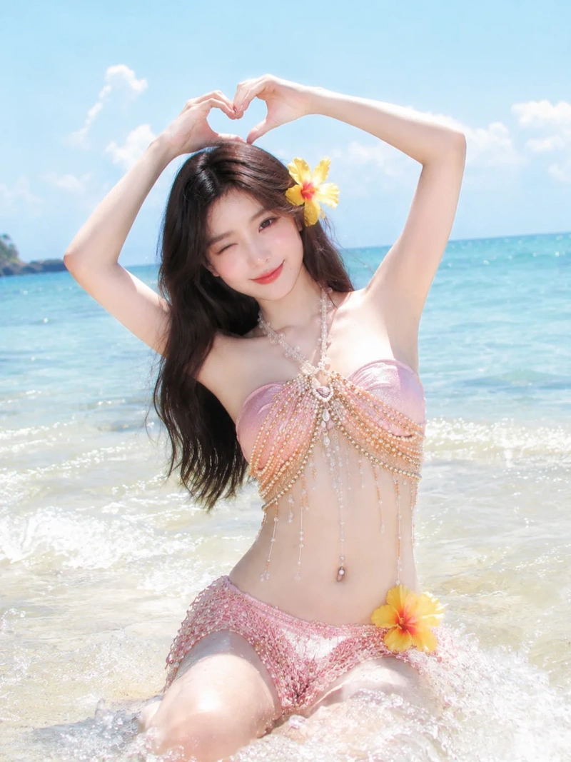 Hình gái xinh mặc bikini hồng thân hình cuốn hút